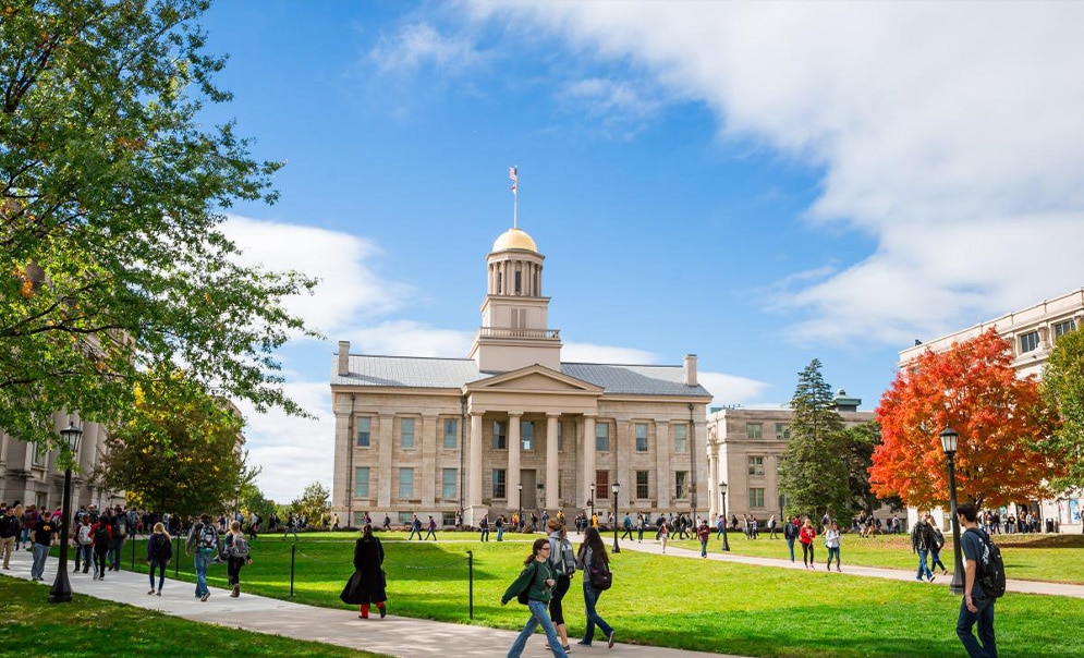 Students walking past university building