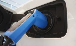 Plug charging electric car