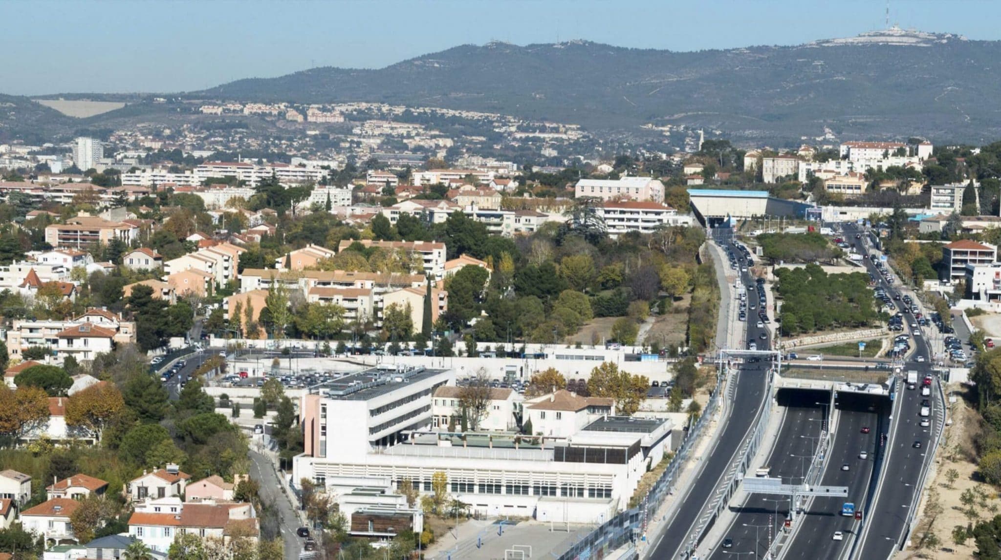 Aerial view of Marseille with highway off to the right hand side.