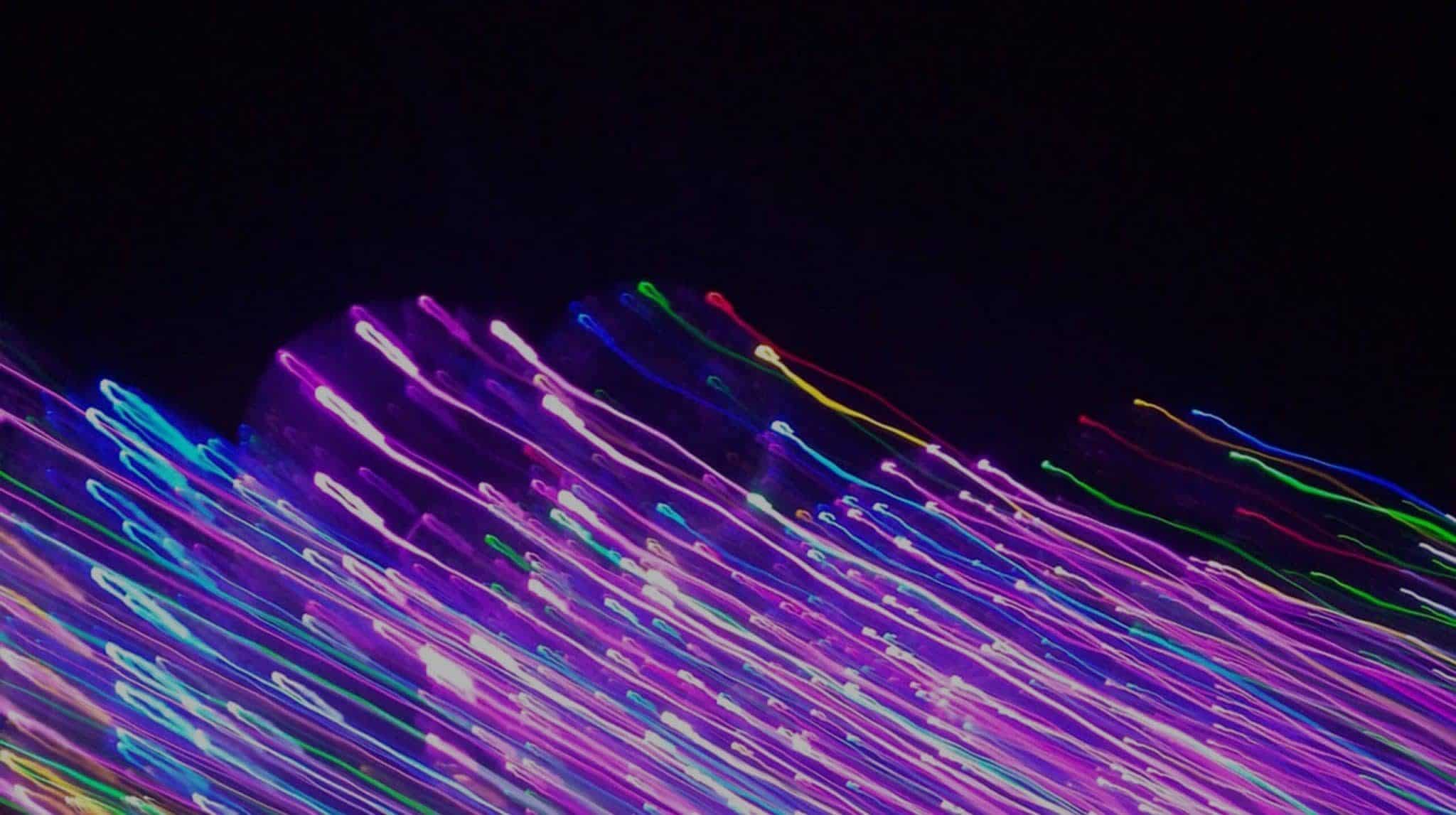 Coloured lights on black background
