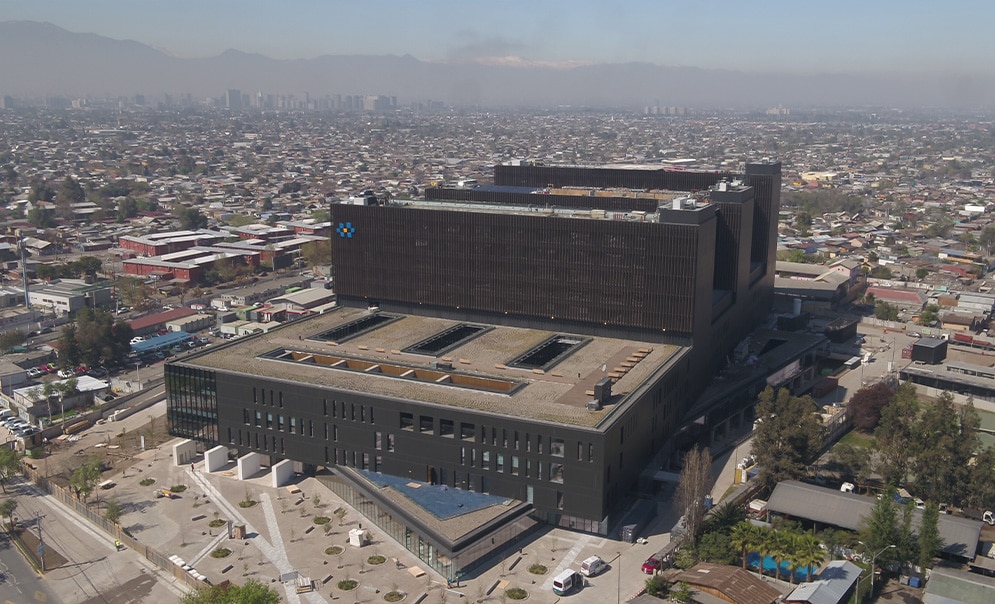 Aerial view of hospital with city in the background