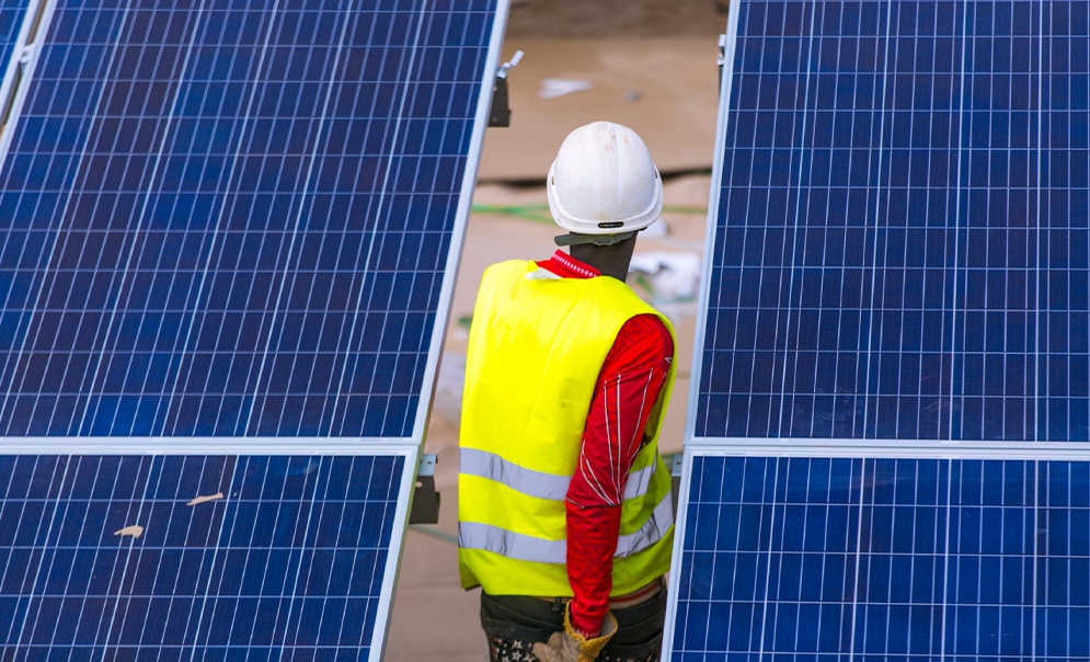 Engineer fixing solar panel